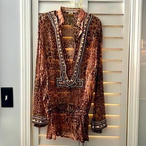 Gorgeous beaded mini dress or top with bell sleeves.